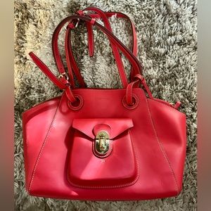 Dooney & Burke leather bucket bag in bright orangy/red!